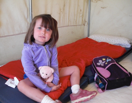 My daughter in our Roar and Snore tent