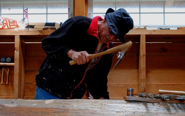 A totem carving demonstration in the Tongass National Forest near Ketchikan, Alaska