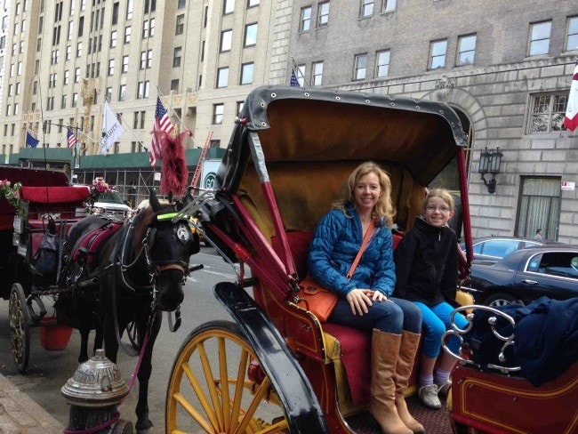 mother and daughter carriage ride