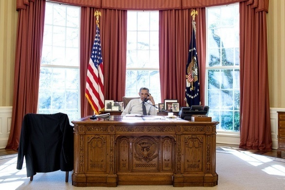 President Barack Obama at the Resolute Desk in the Oval Office (Photo credit: The White House)