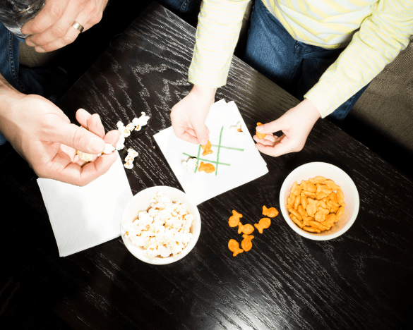 Love is in the details, like these game napkins that encourage family play at Embassy Suites evening receptions 