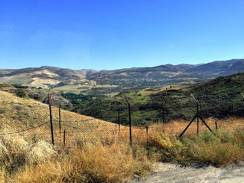 A view of Jordan from behind barbed wire in the West Bank in Israel 