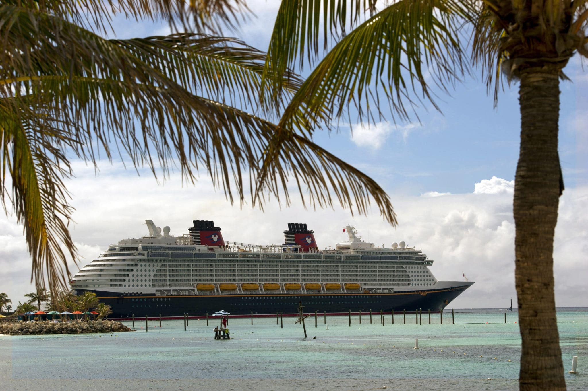 Disney Fantasy docked at Castaway Cay, a private island owned by Disney in the Bahamas