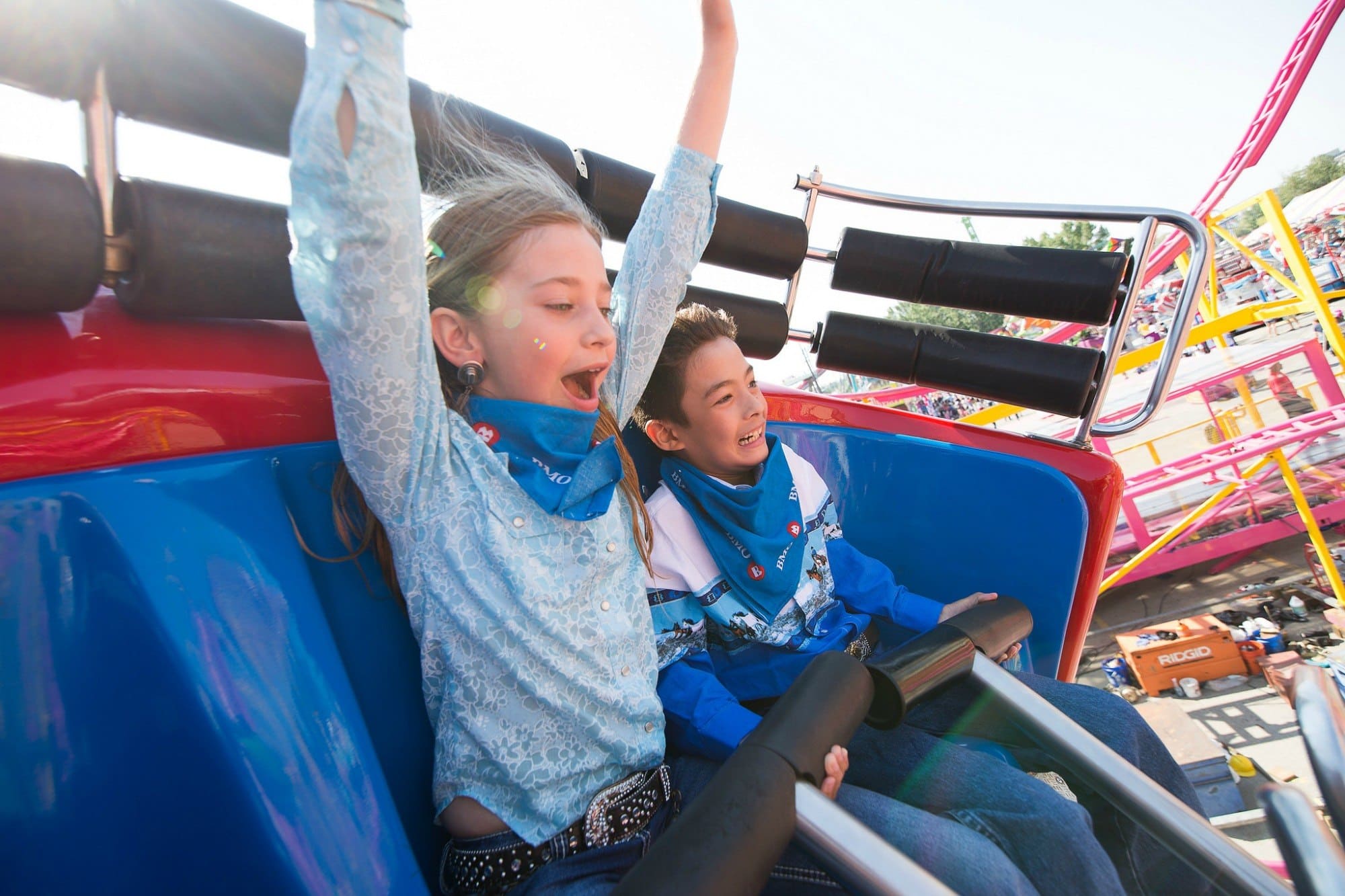 children on amusement park ride