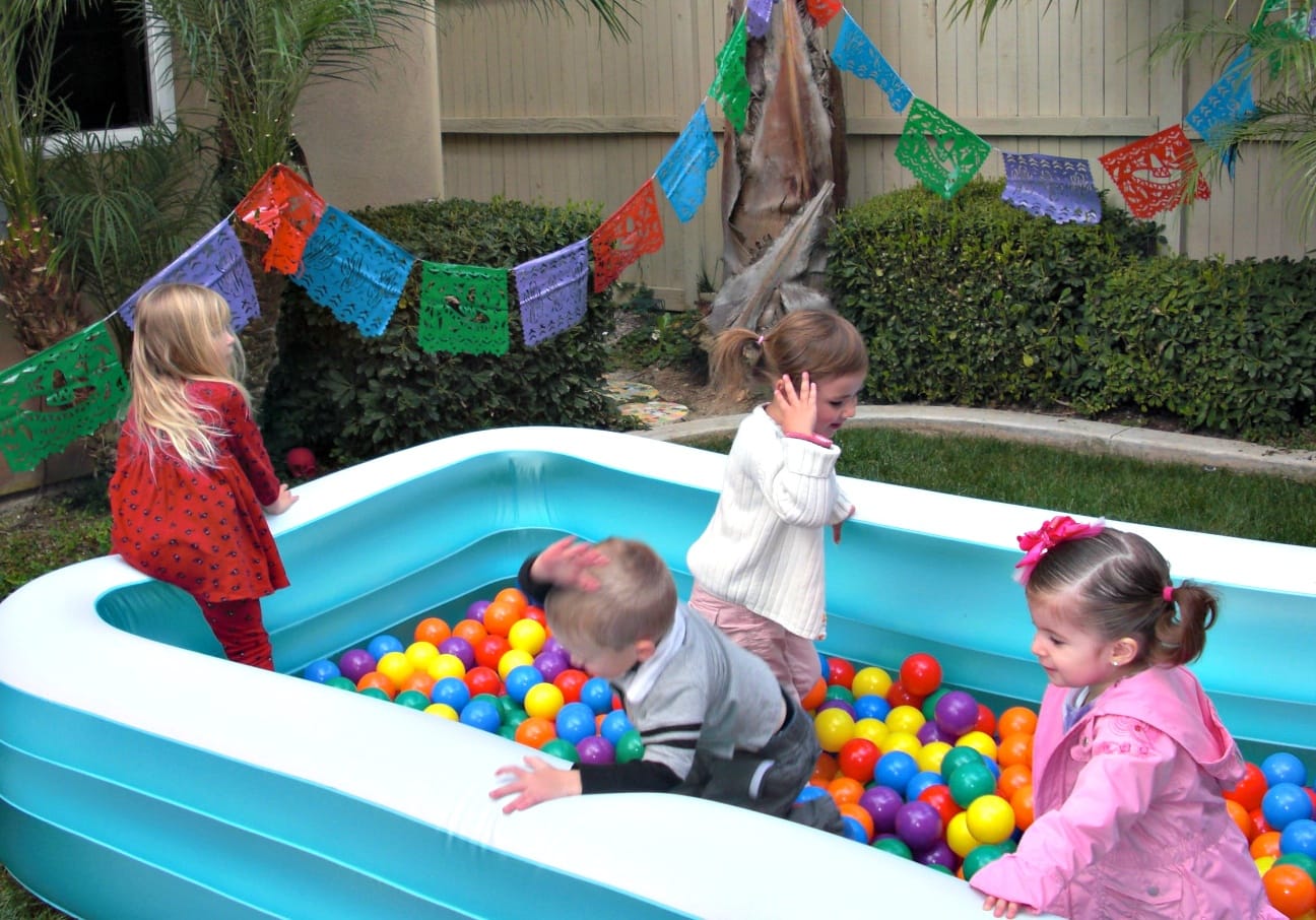 Fill your play pool with plastic balls to make your own ball pit ~ 10 Fun in the Sun Summer Boredom Busters