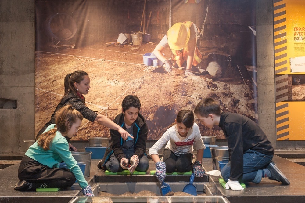 An archeological workshop with kids at Montreal Museum of Archeology and History