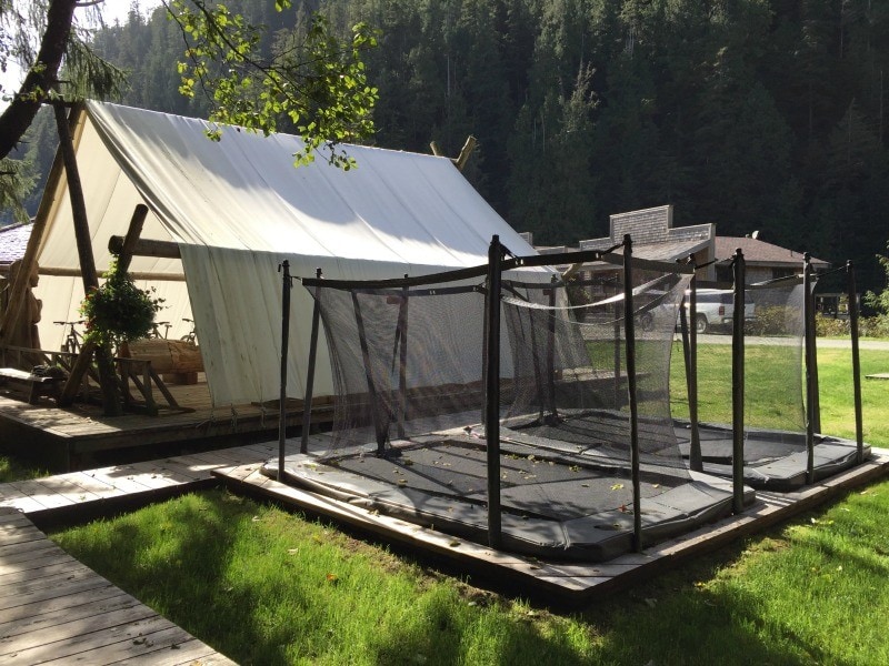 Kids will love this in-ground trampoline and outdoor ping pong table. (Photo credit: Claudia Laroye)