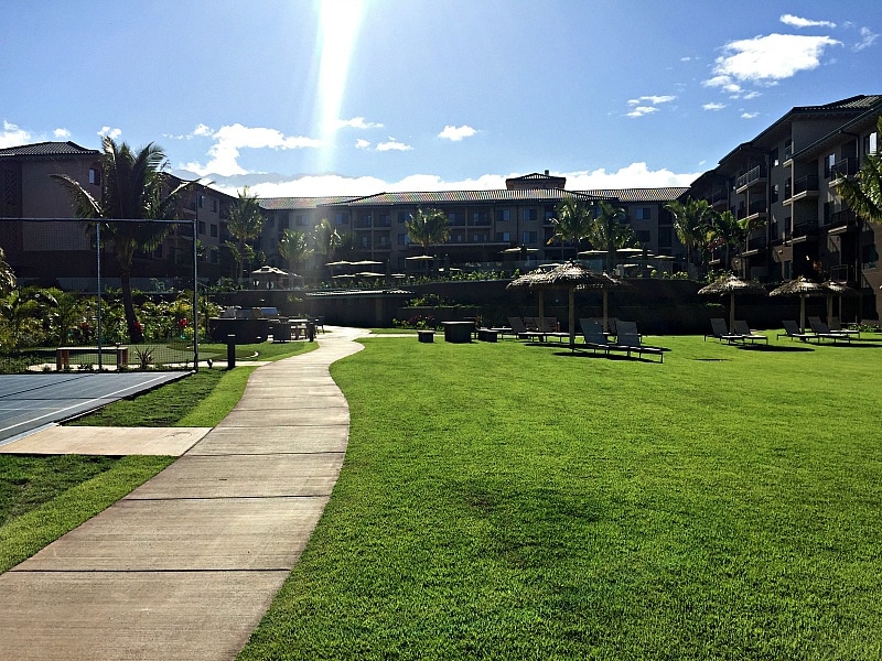 View of Residence Inn Maui lawn and sport court 