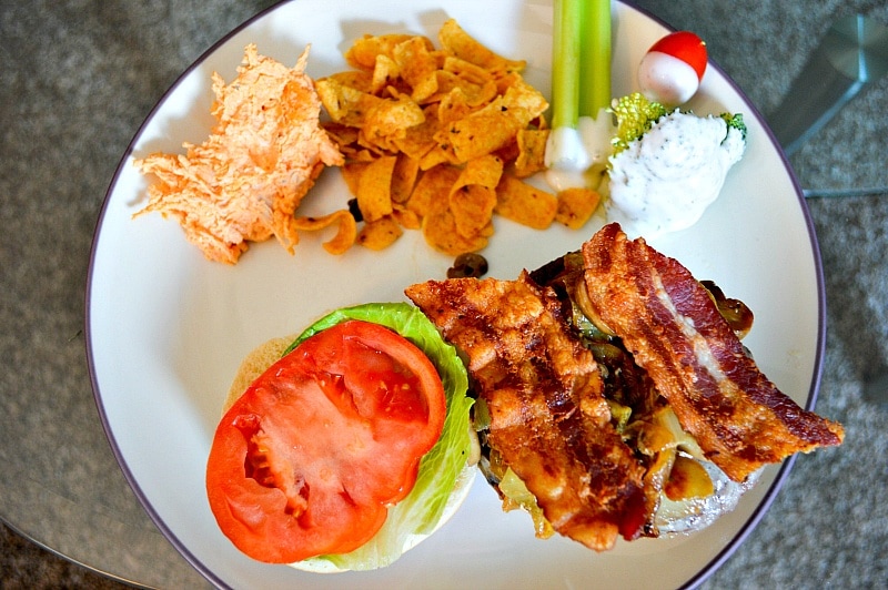 A kicked-up tailgate burger bar plate