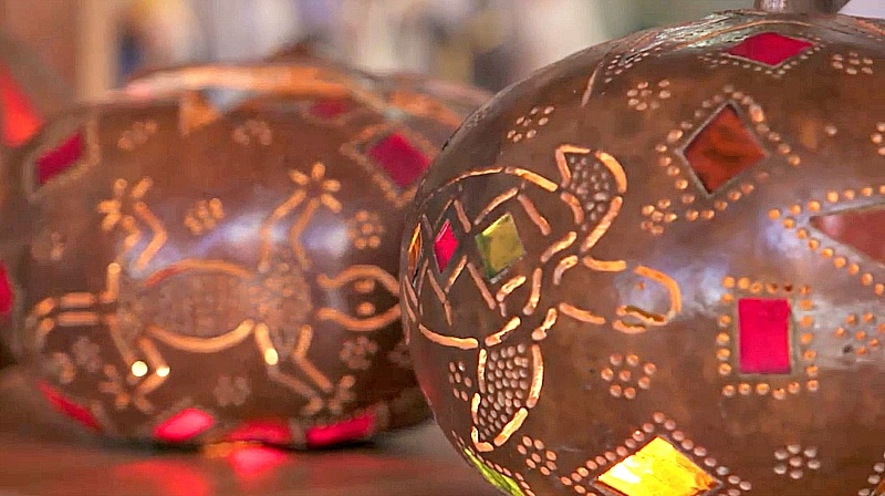 Glowing art made by local artisans (Screenshot from The Voyager with Josh Garcia)