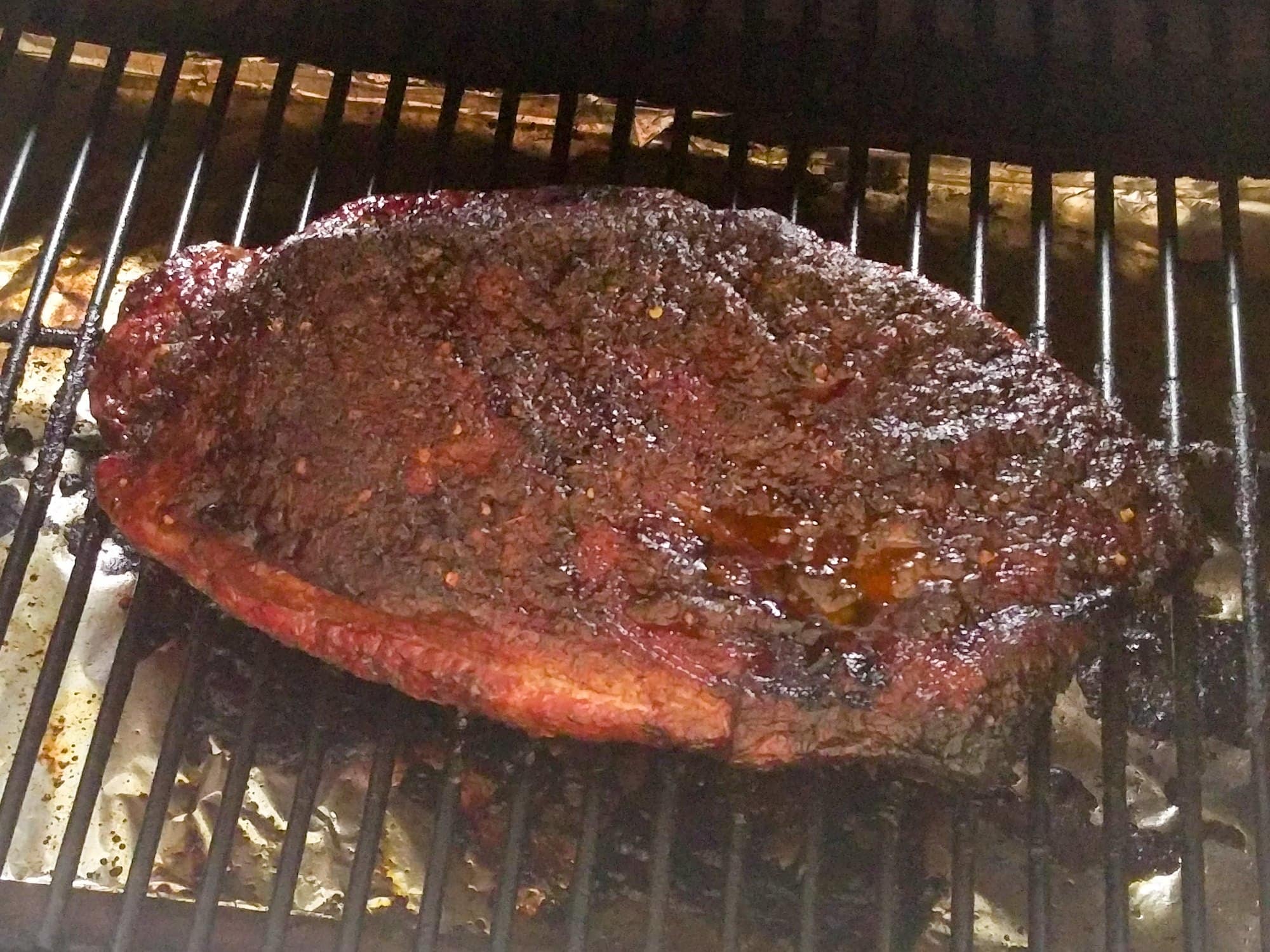 A tasty beef brisket smoking on my Traeger