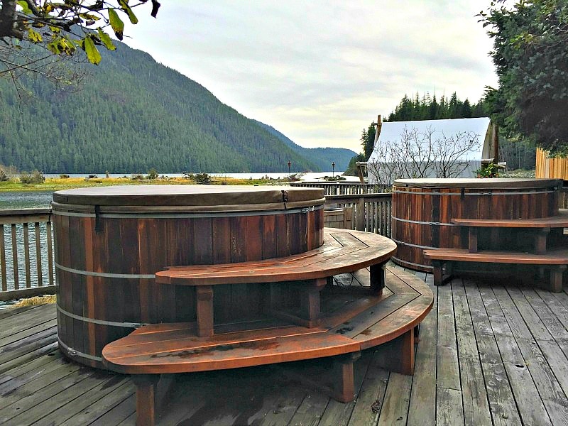 Soak in one of two wooden hot tubs with a view of Bedwell Sound at Clayoquot Wilderness Resort