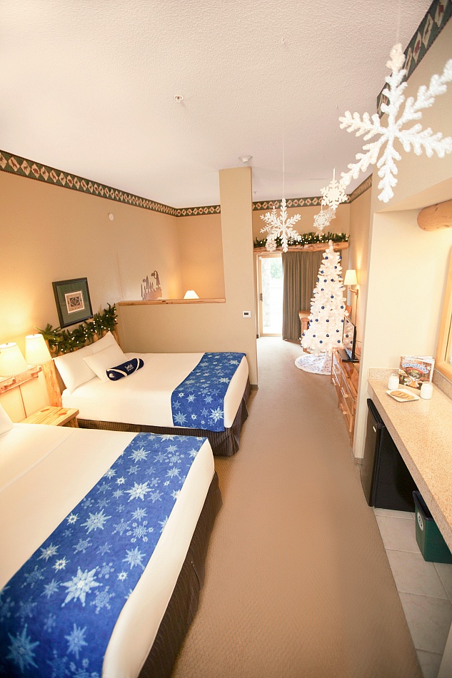 Upgrade to a Great Wolf Lodge suite all decked out for the holidays with a full-sized tree and more