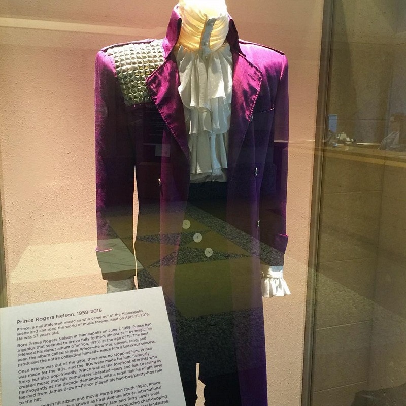 Prince's purple jacket and white shirt from the movie, Purple Rain, are on display at Paisley Park