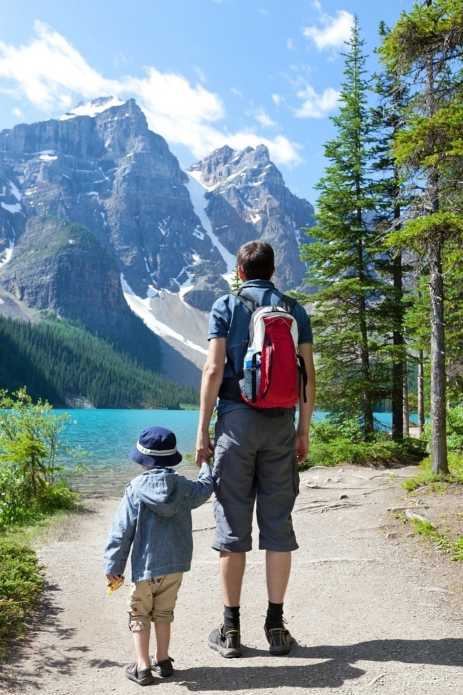 Dad and son hiking in nature