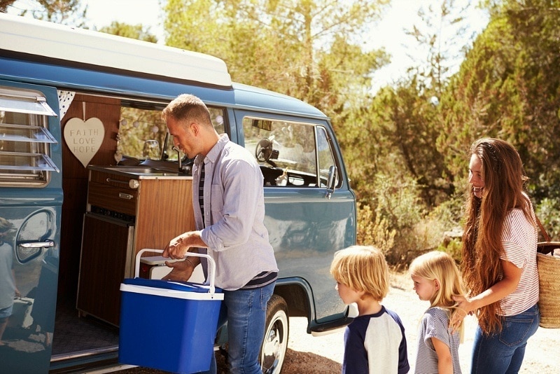 Family with camper van