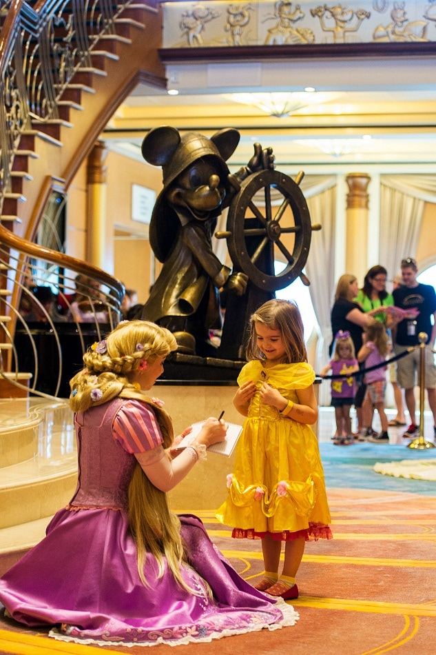 An autograph book makes meeting characters on a Disney Cruise even more fun ~ 13 Lucky Things to Pack for a Disney Cruise