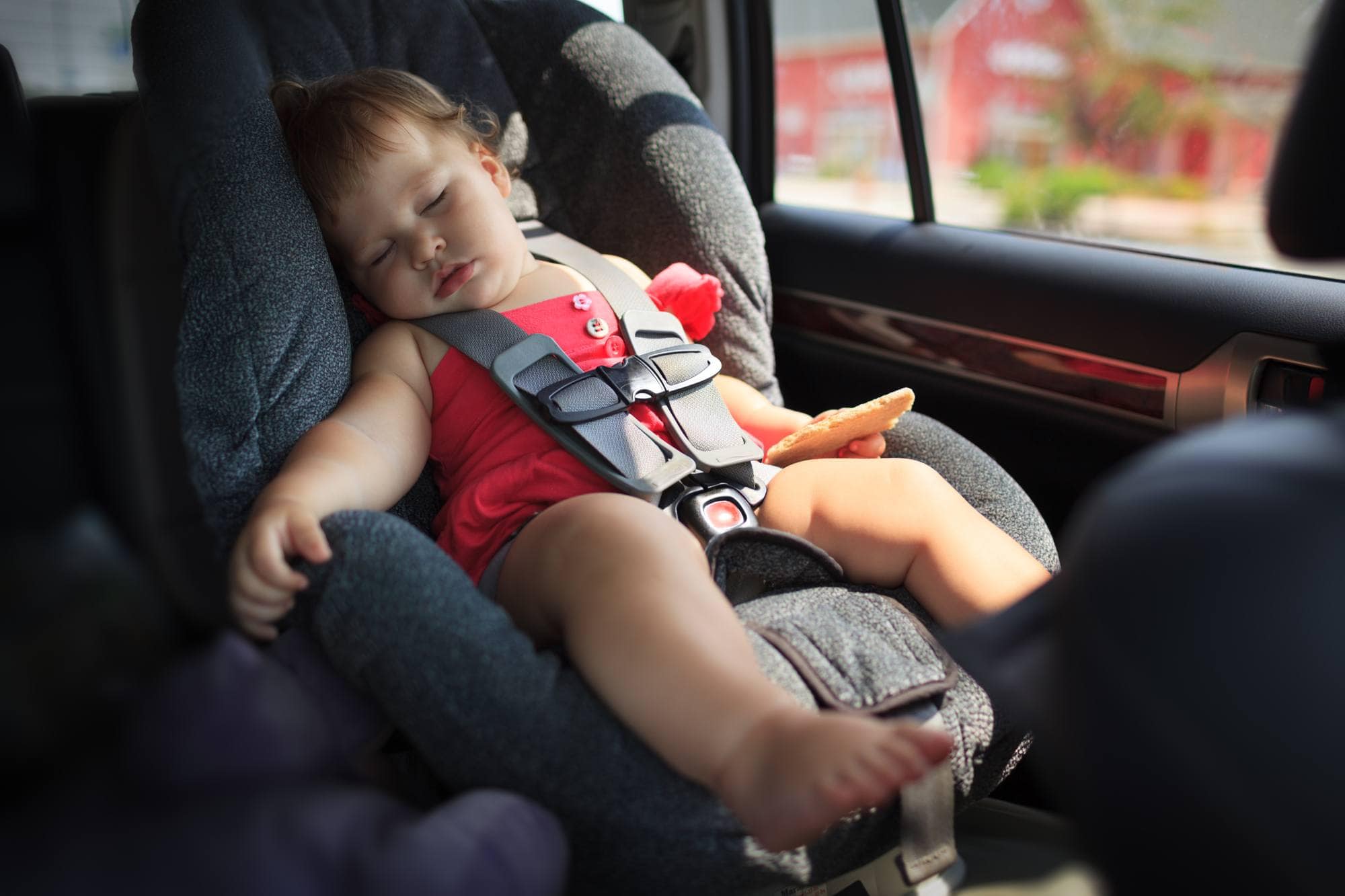 Sleeping baby on road trip