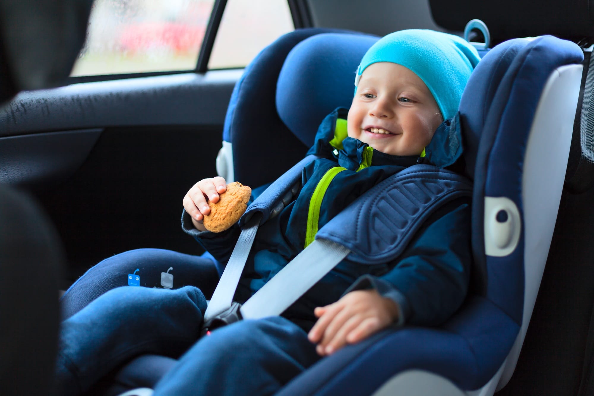 Toddler eating on a road trip