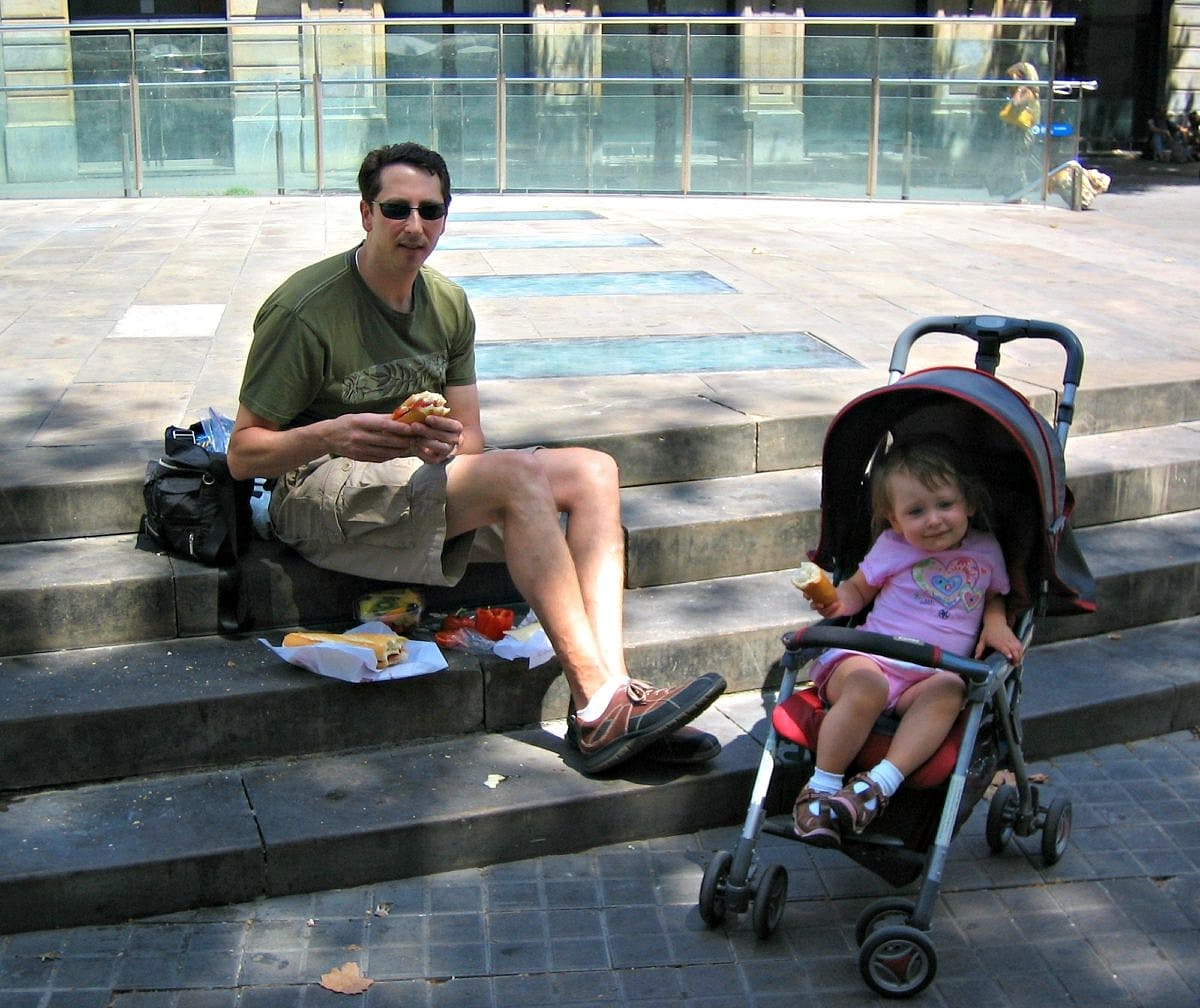 We couldn't find a green space in which to eat so made a picnic from our La Boqueria finds on these stairs in Barcelona