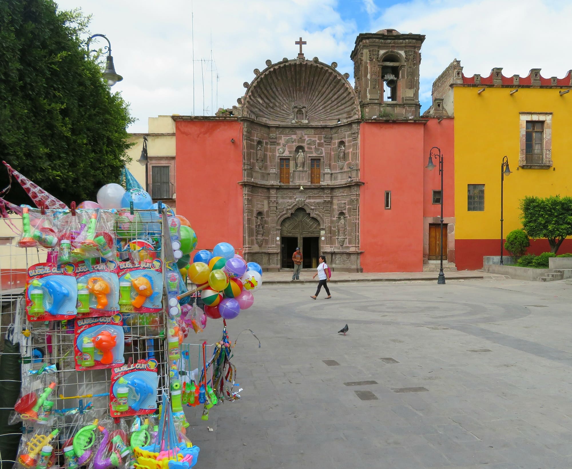 Toys for sale at Plaza de la Soledad in San Miguel de Allende with kids