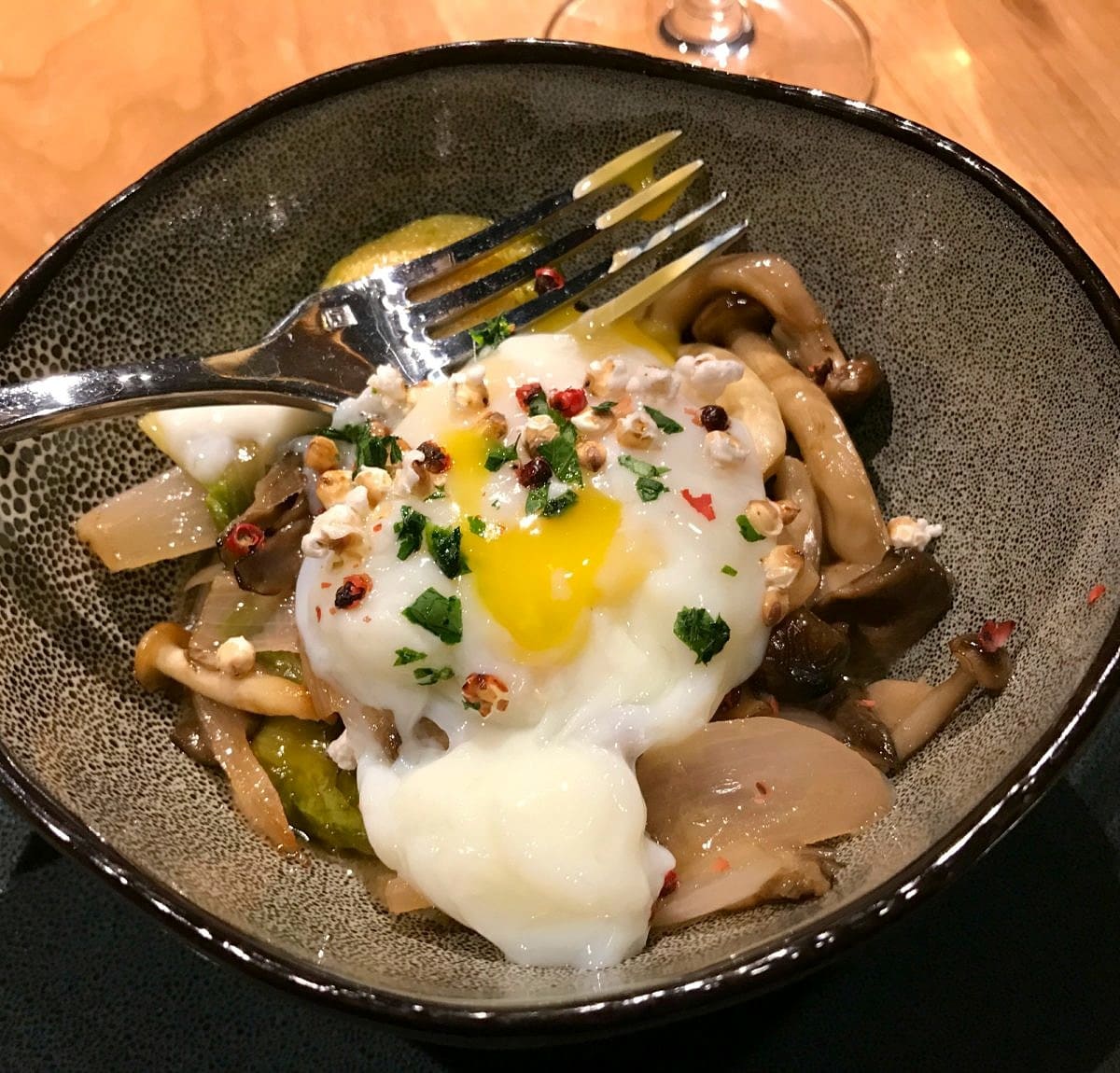 My Organic Farm Egg starter at Manzanita served with wild mushroom ragout, Brussels sprout, sorghum "popcorn" and truffle