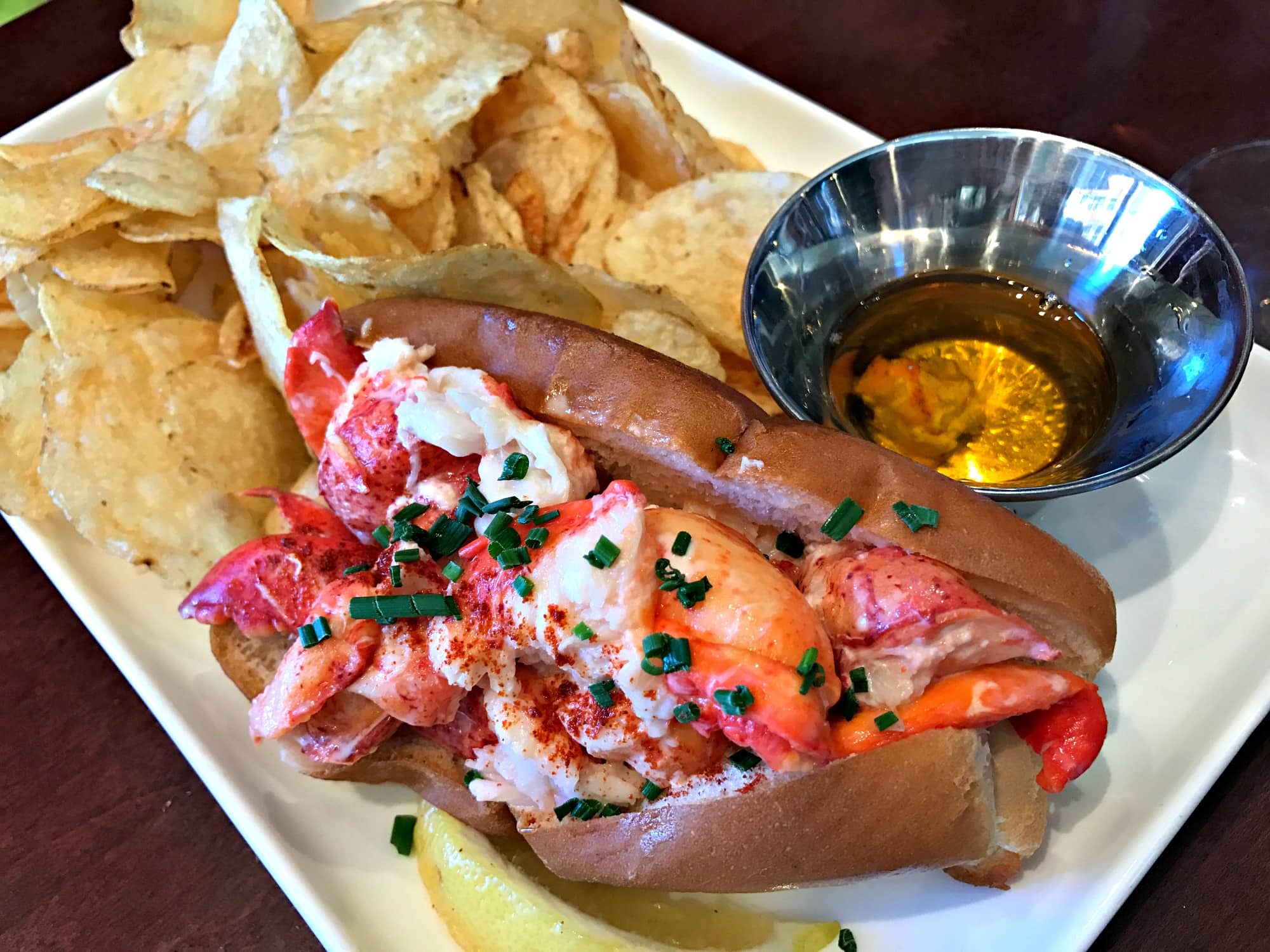 Fuel up at Tavern 6330 salads, burgers and sandwiches like this generous lobster roll at Northstar Ski Resort with kids