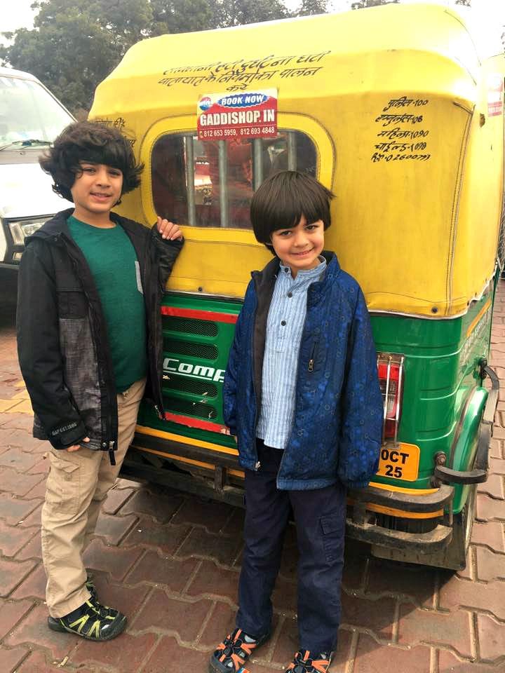 My sons, Alexander and Veer, about to ride an auto rickshaw, known locally as a tuk-tuk in India with children