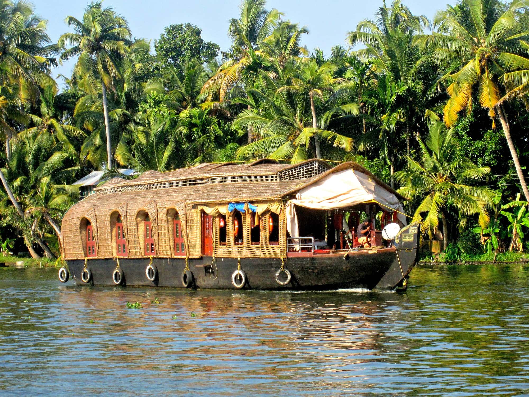 A houseboat in Kerala, India with kids