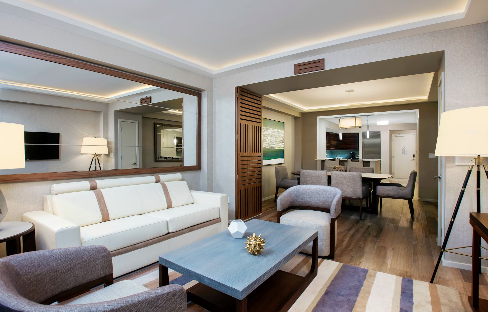 An expansive suite with plenty of room for traveling families at Conrad Fort Lauderdale Beach