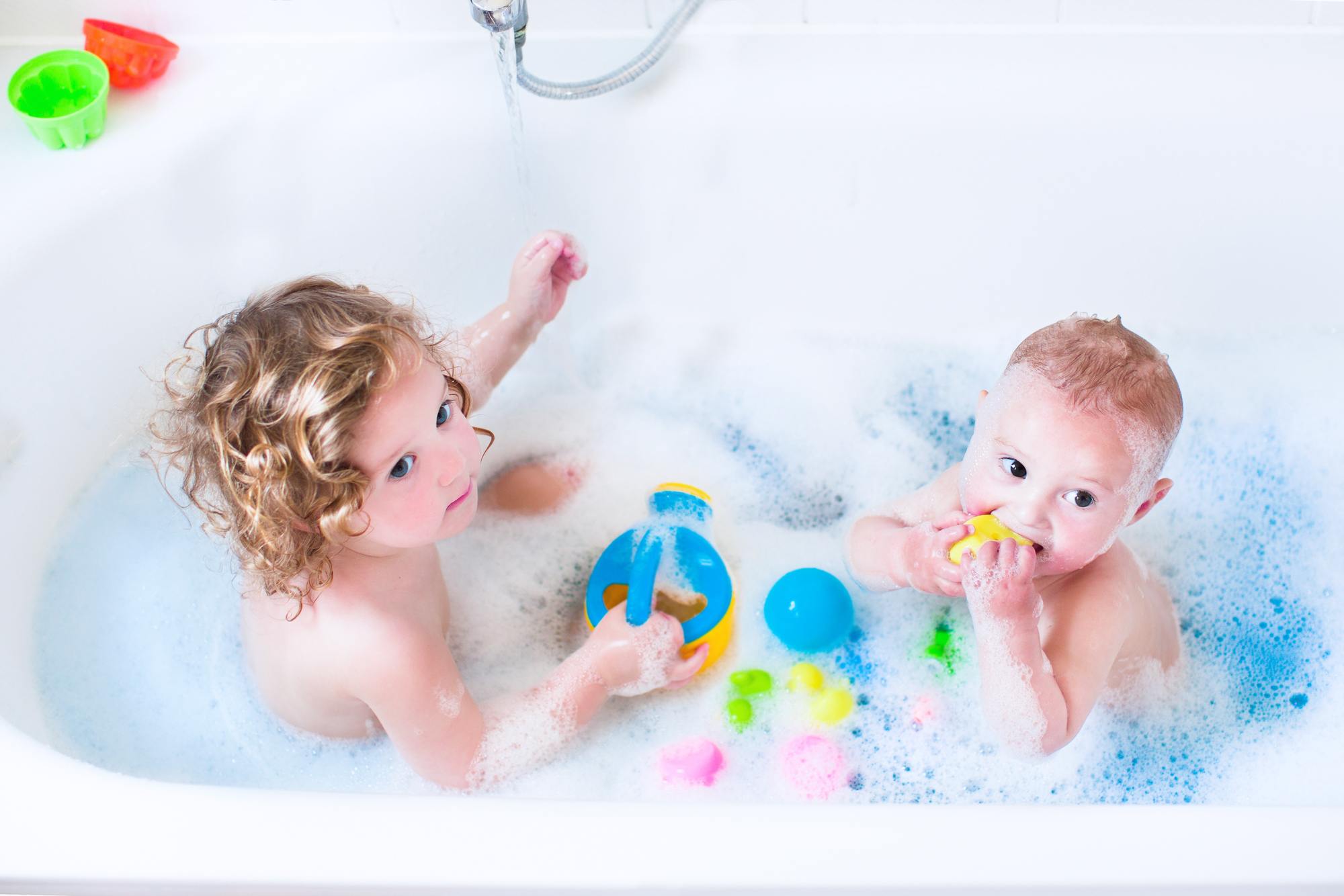 Toddler and baby having a bedtime bath