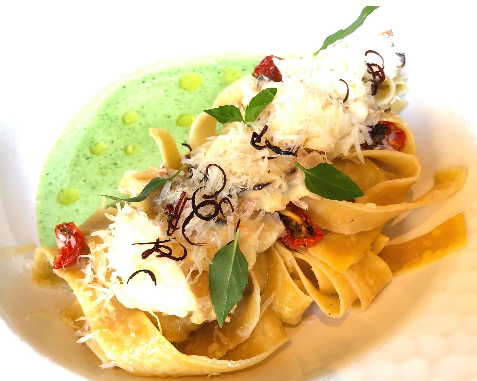 Crab-topped handmade pasta served with pesto cream sauce at Restaurante 1826 at the Rosewood Hotel in San Miguel de Allende, Mexico