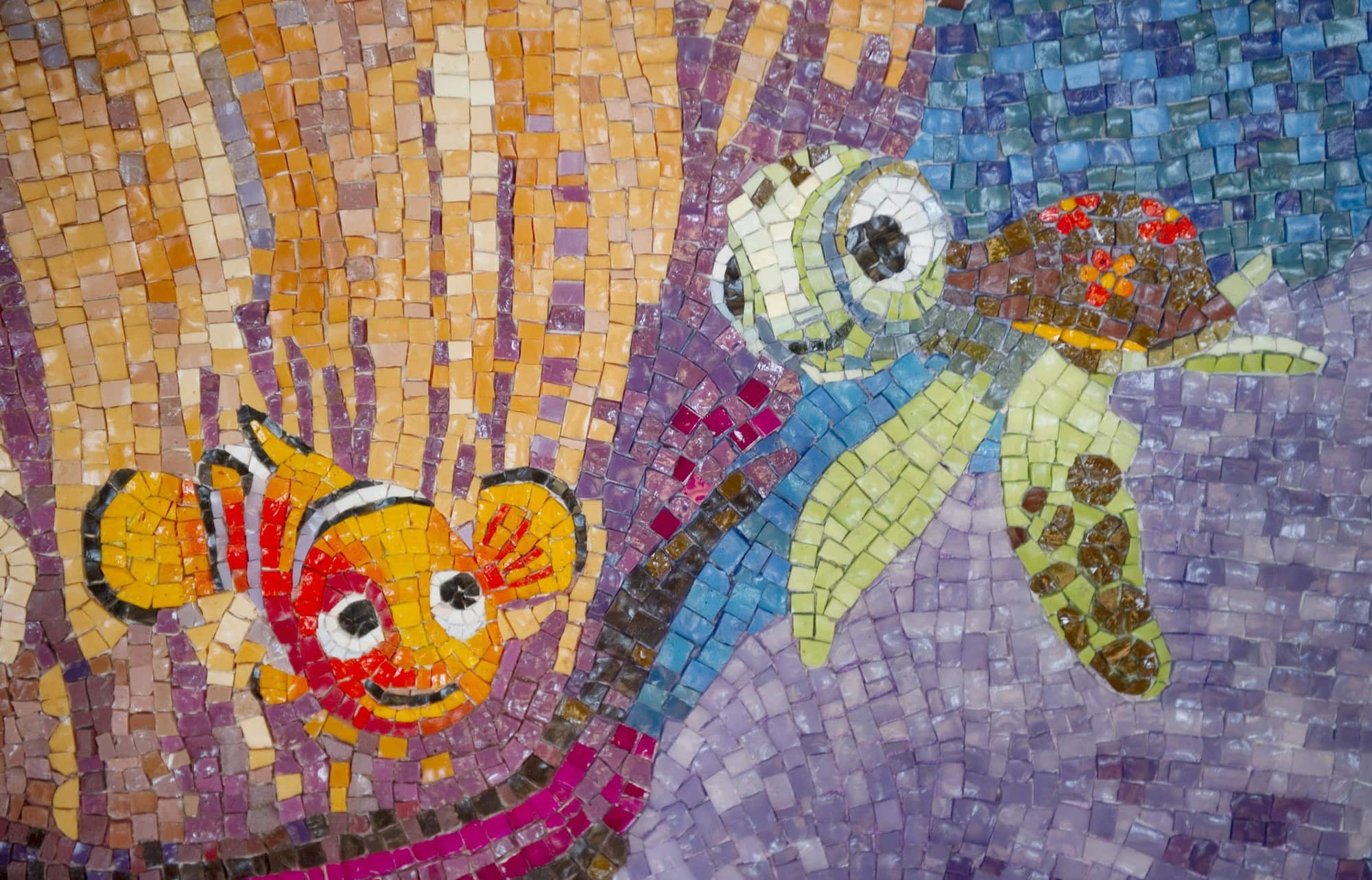 A Finding Nemo-themed mosaic adds to the beach theme at Cabanas on Disney Dream with babies, toddlers and children