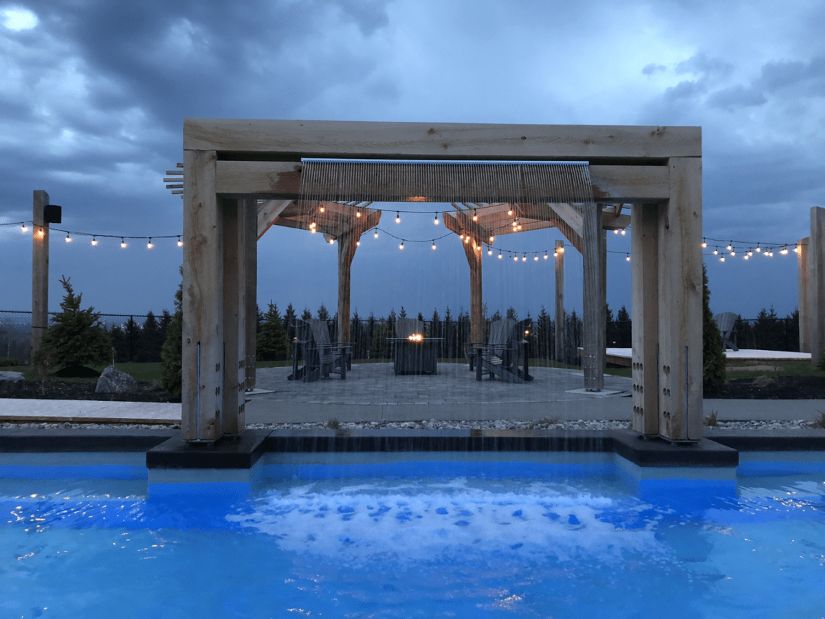 Pool with a waterfall at USVA Nordik Spa in New Brunswick