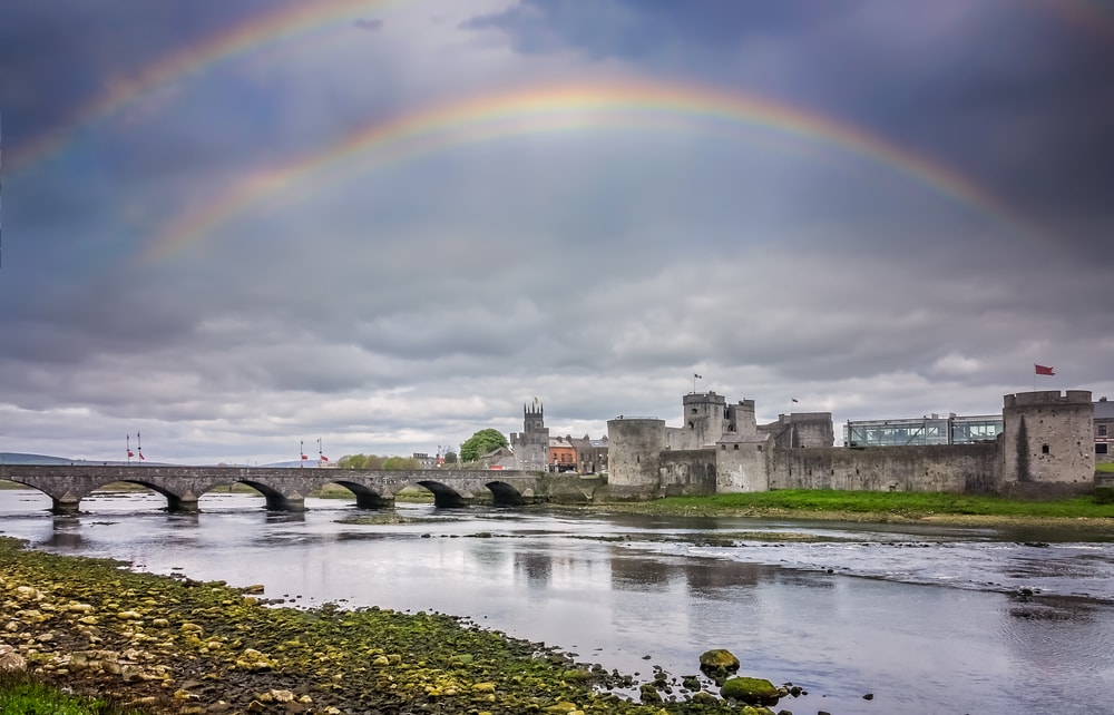 Rainbow over King John's Castle in Limerick, Ireland 