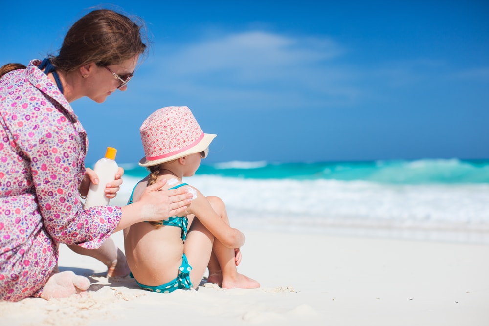 Be sure to apply sunblock on kids when traveling, even when you're NOT at the beach