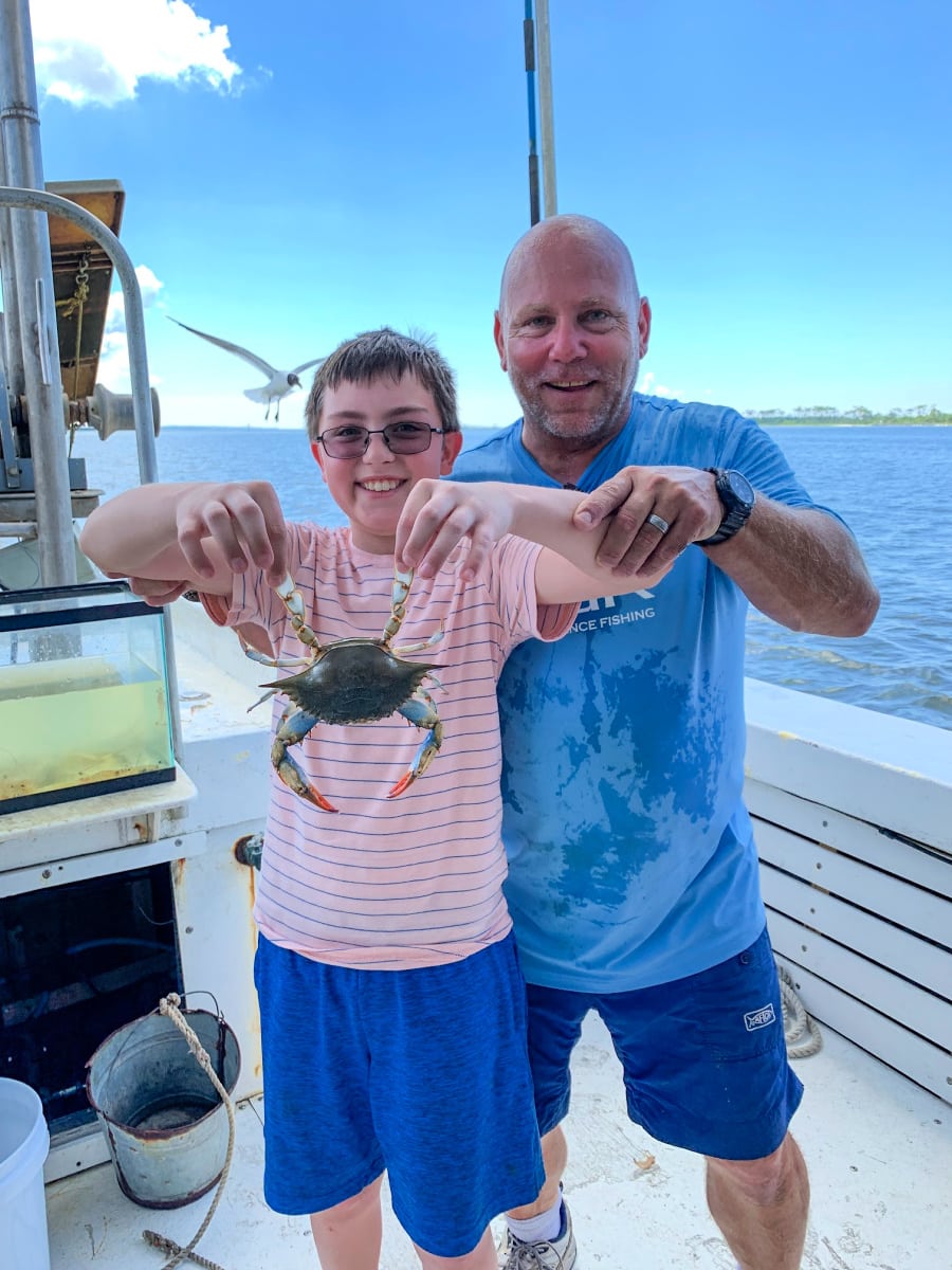 A freshly caught blue crab on the Biloxi Shrimping Trip in Mississippi Gulf Coast with kids