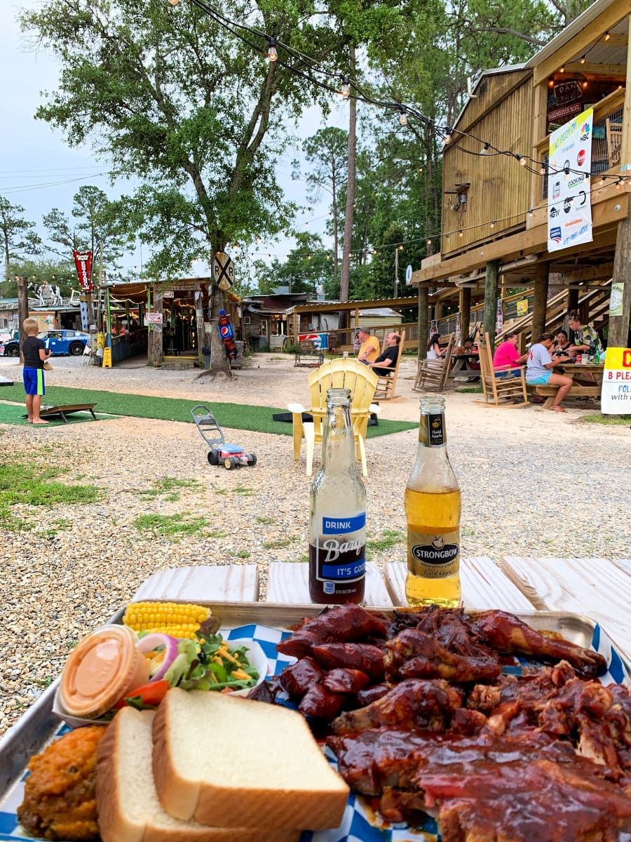 ShedHed barbecue sampler platter at The Shed BBQ & Blues Joint in Coastal Mississippi with kids