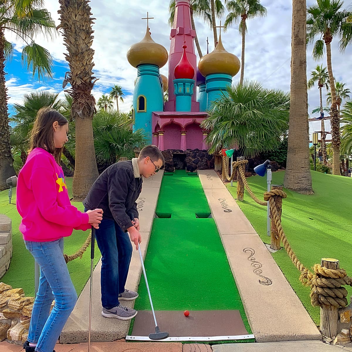 Kids playing miniature golfat Castles N' Coasters in Phoenix