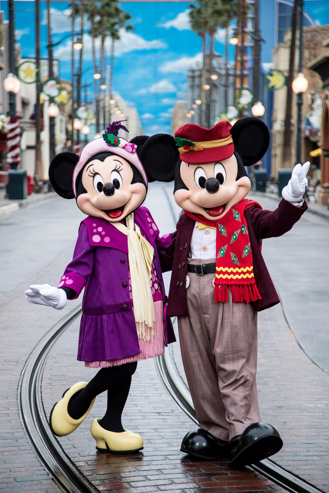 Minnie Mouse and Mickey Mouse dressed up for the holidays