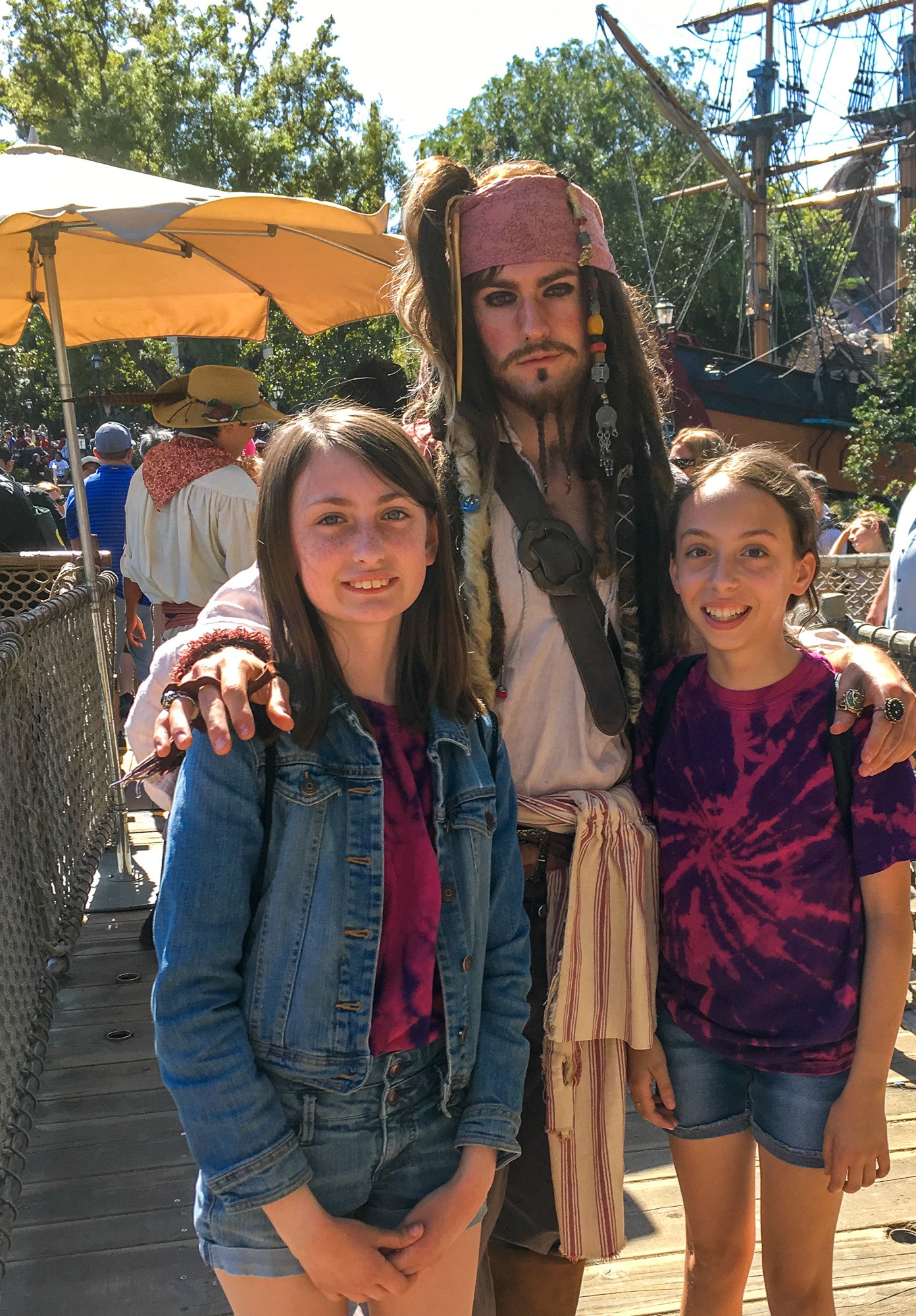 Teen girls with Captain Jack Sparrow at Disneyland