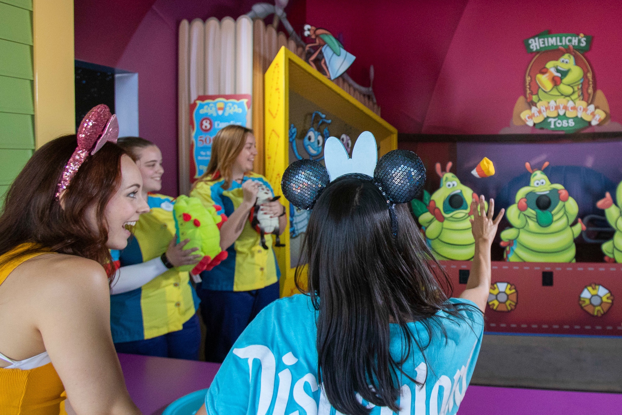 Teens playing Pixar Promenade Games at Disney California Adventure