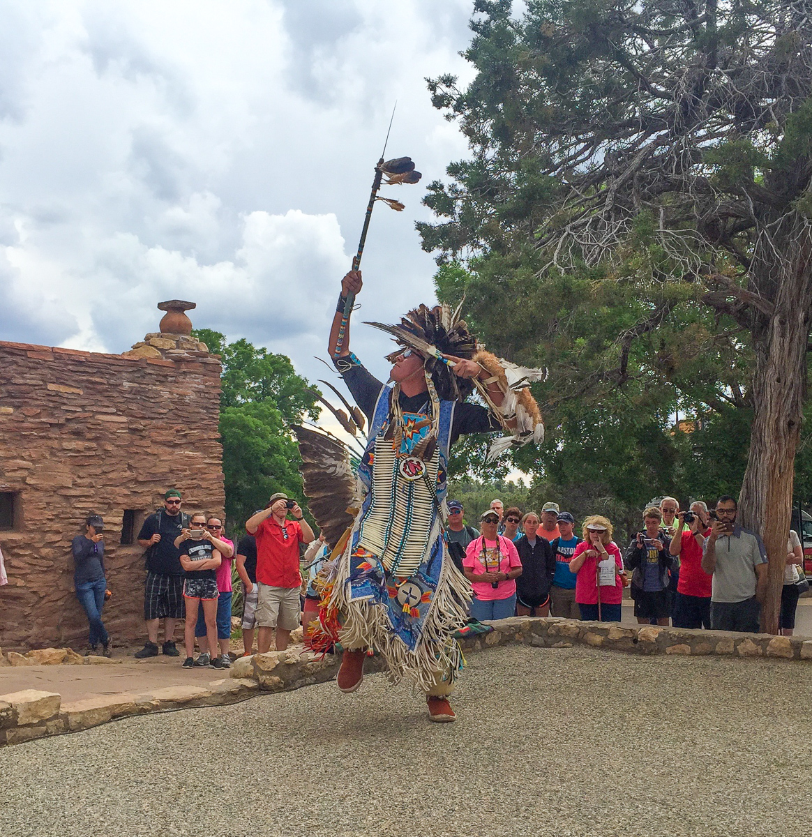 A Navajo troupe member performing a traditional dance near Hopi House at the South Rim of the Grand Canyon