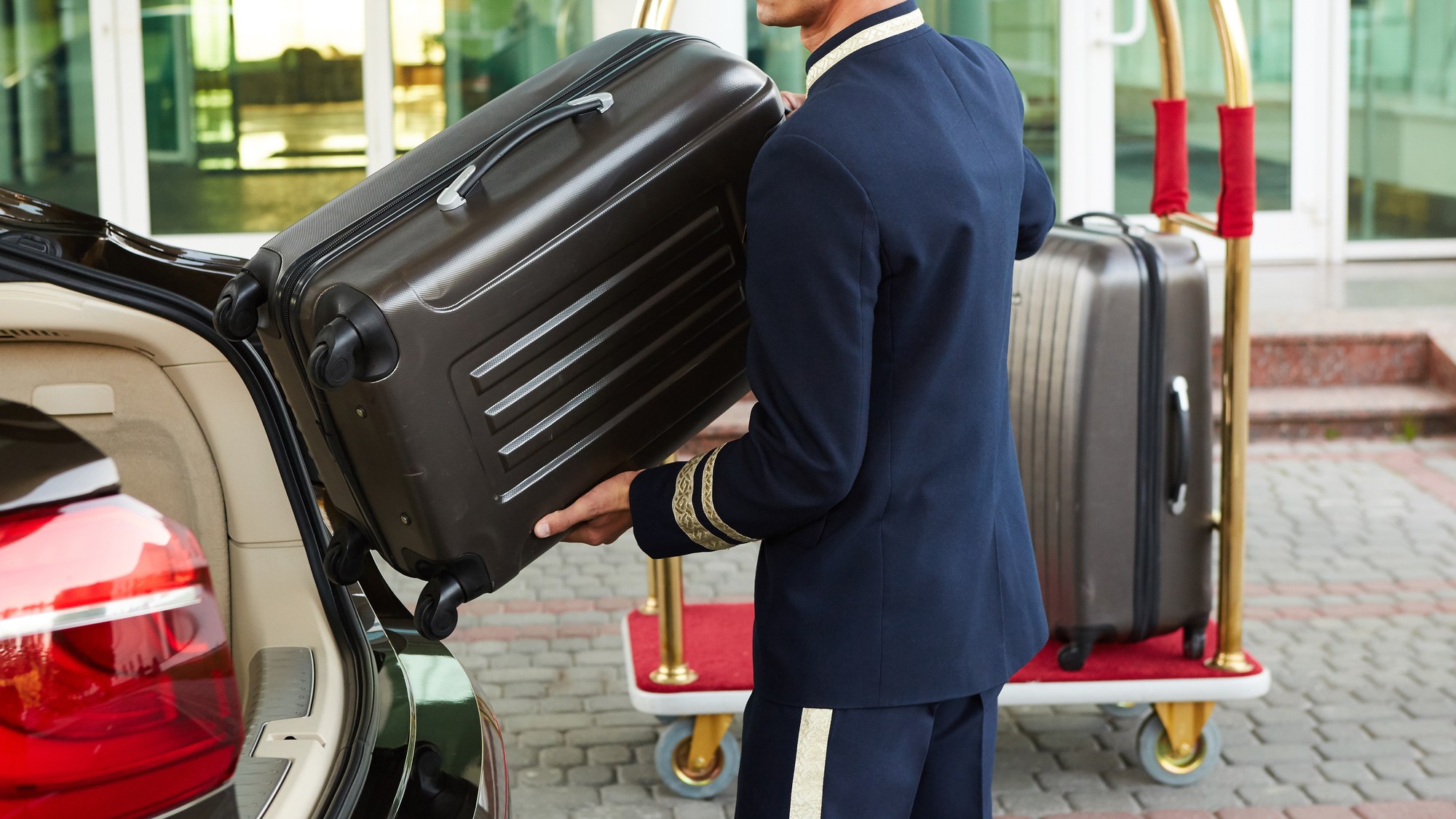 Bellman helping with luggage