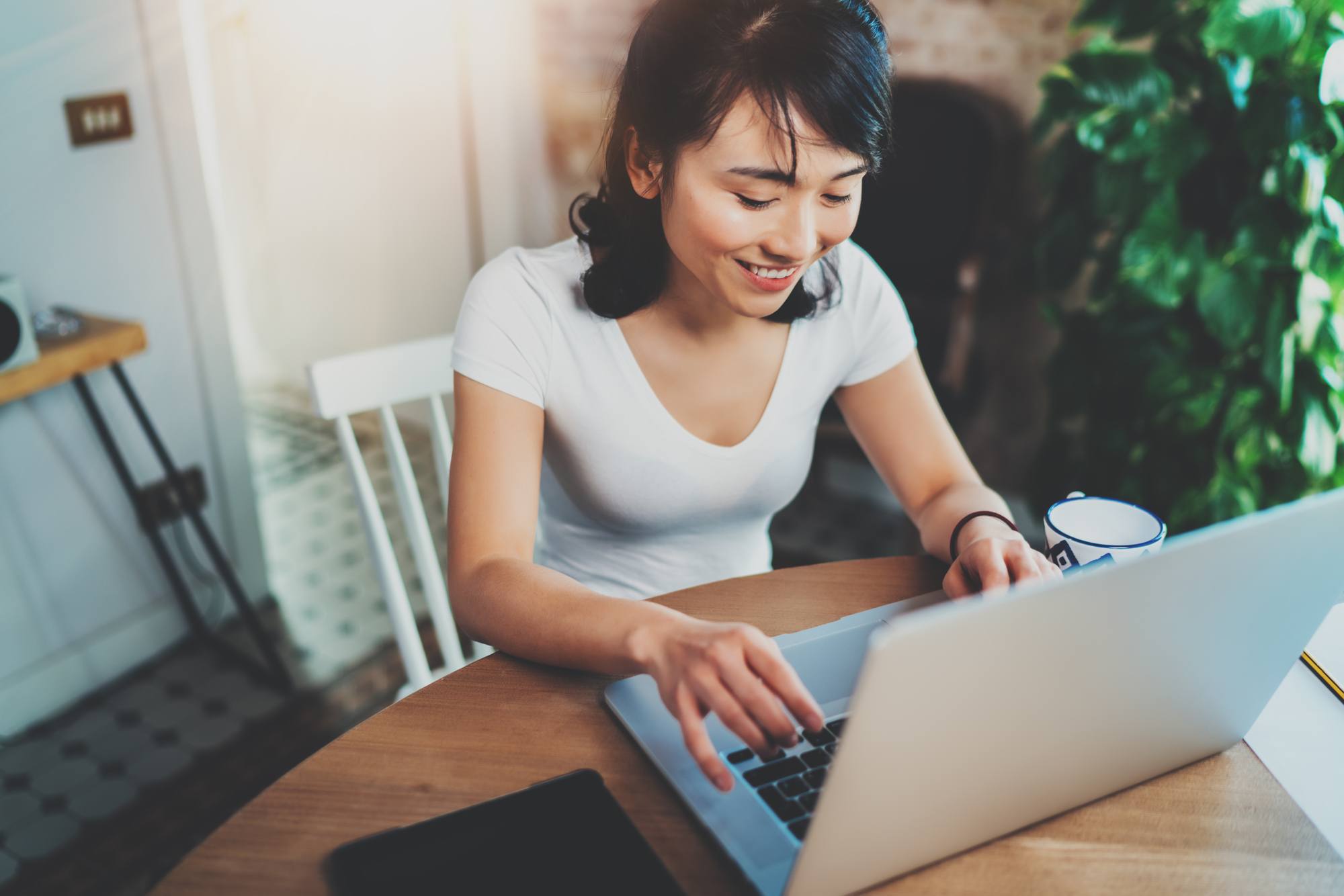 Woman entrepreneur at computer