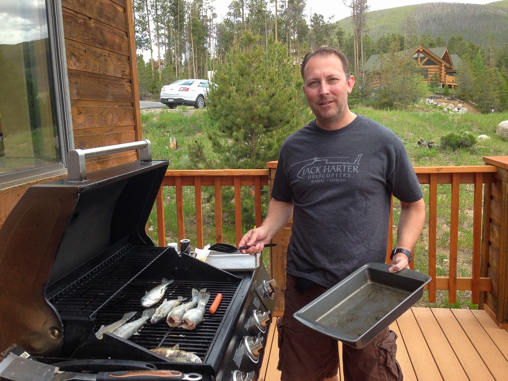 Fresh-caught fish being grilled by at rental cabin in Keystone