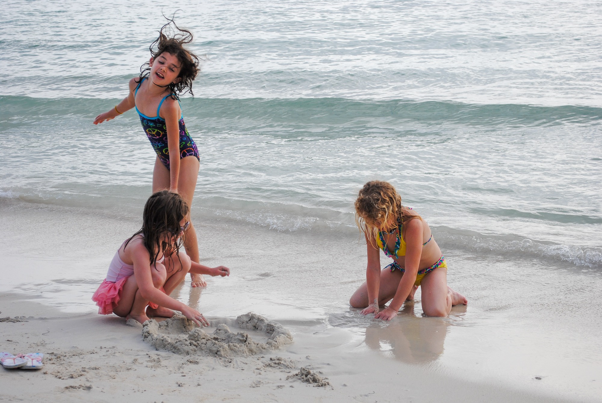 Children playing on the seven-mile beach in Negril