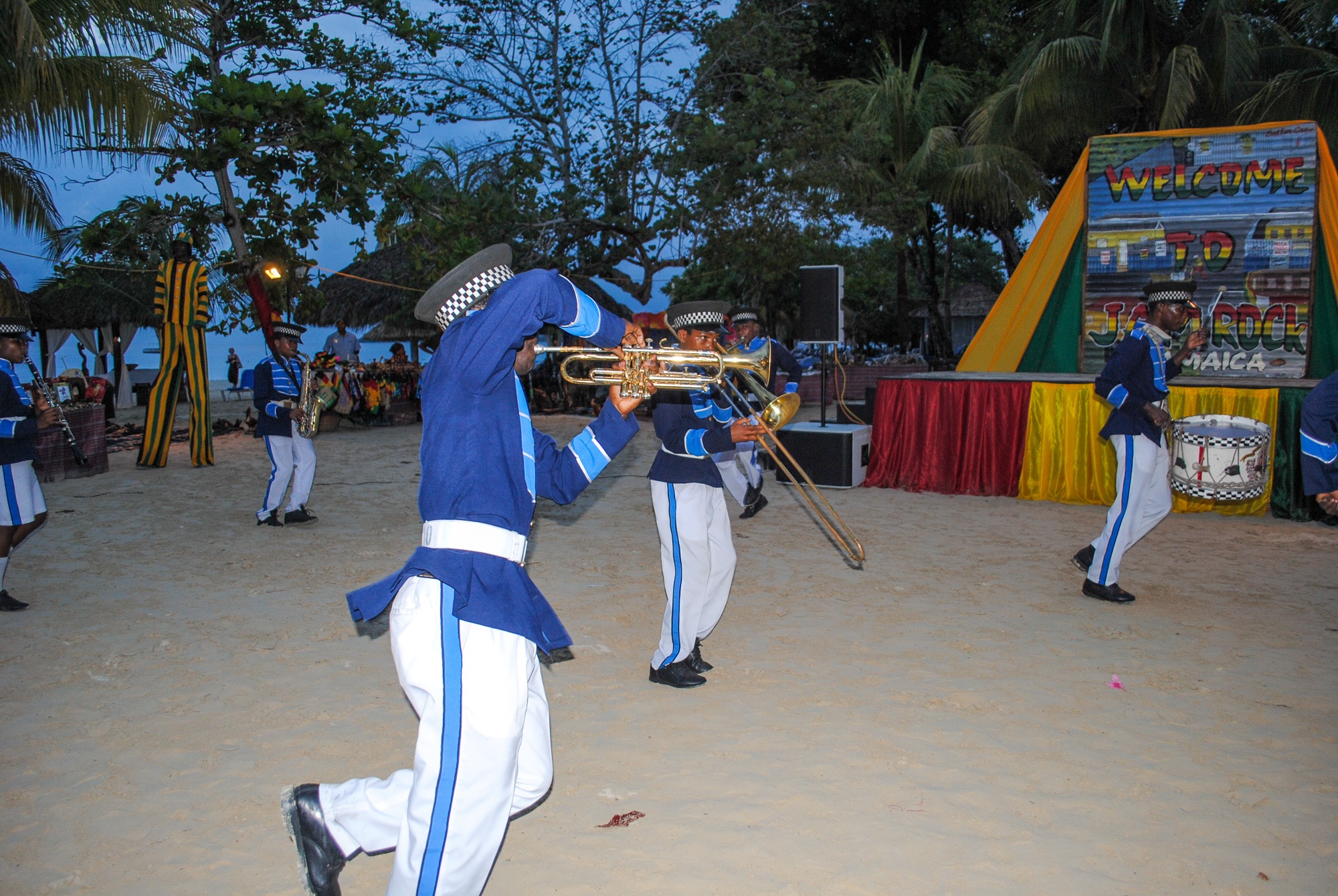 Local youth marching band performing on the sand in Jamaica