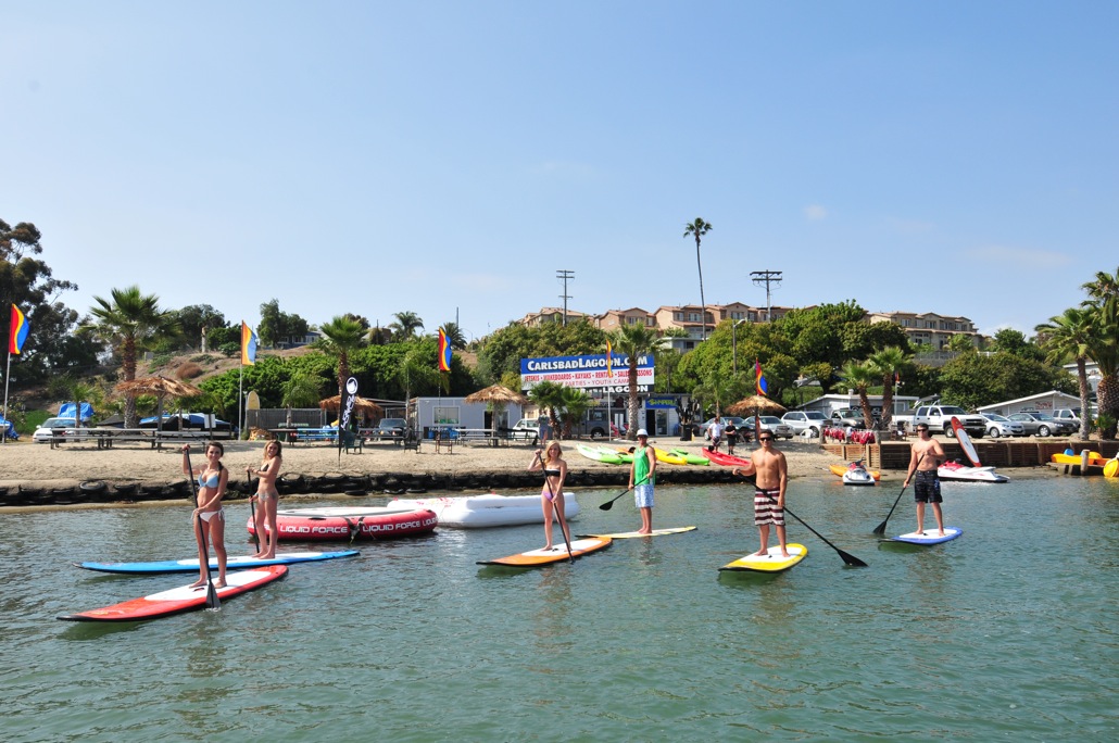 Stand-up paddle boarders on Carlsbad Lagoon