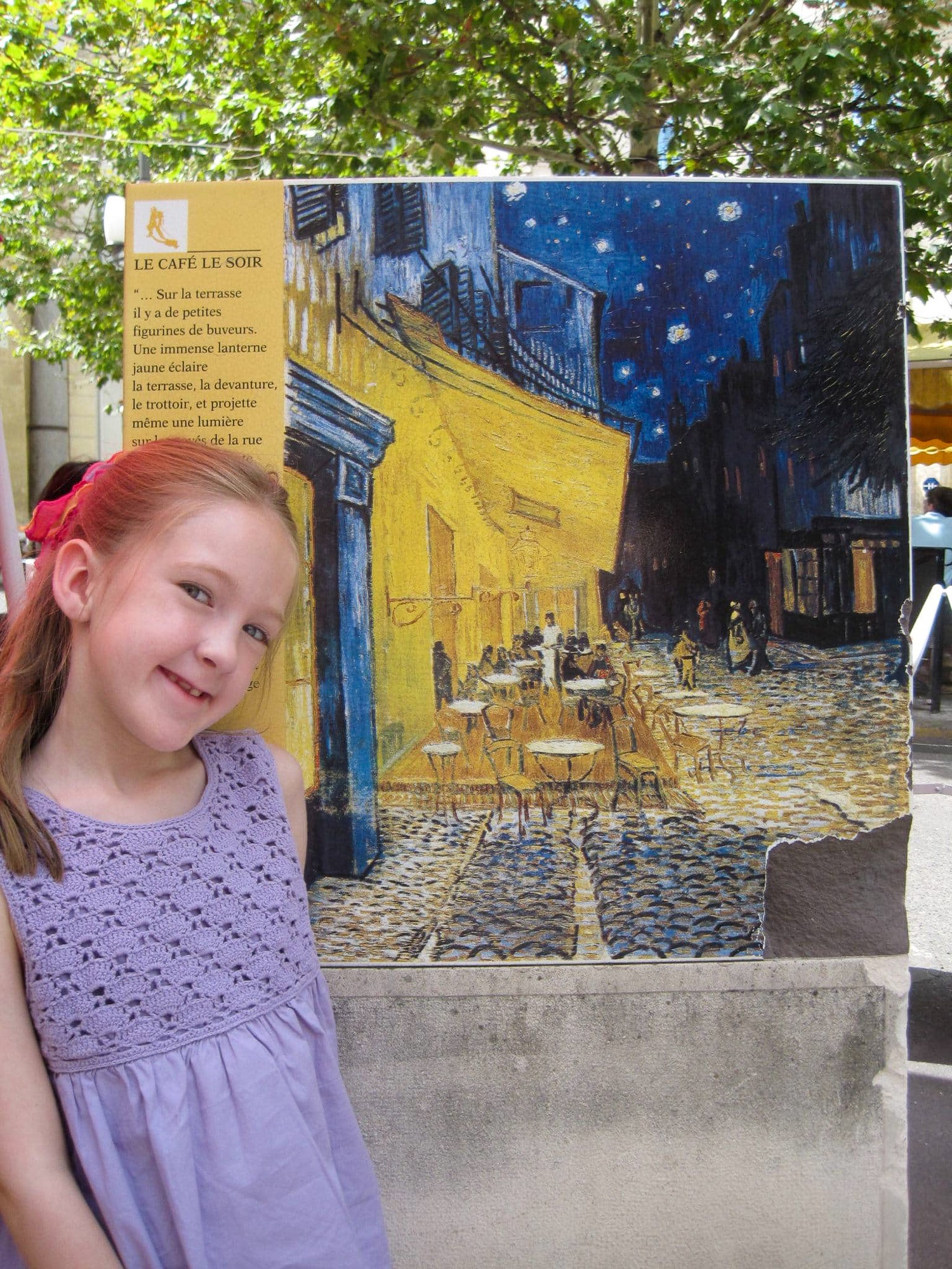 Little girl with Van Gogh posted in Provence